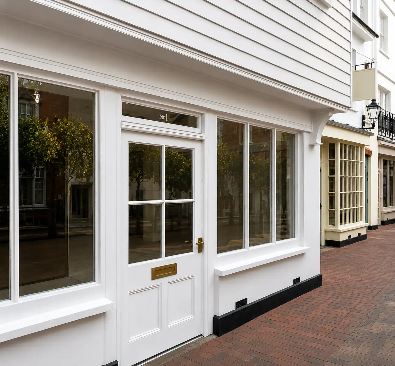 Hand-built white painted period shopfront on a Sussex high street